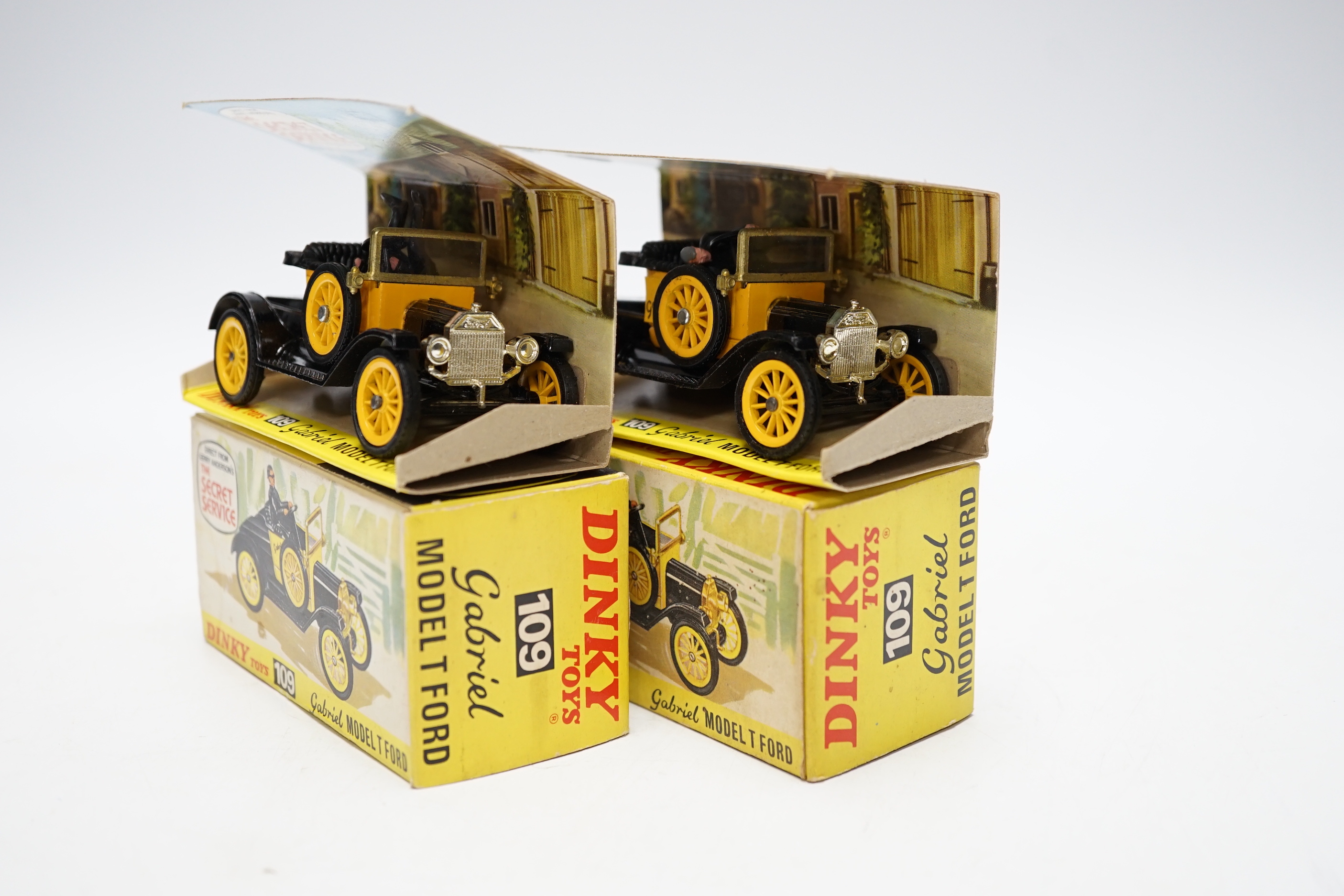 Two Dinky Toys (109) Gabriel Model T Ford, both boxed with inner display stands